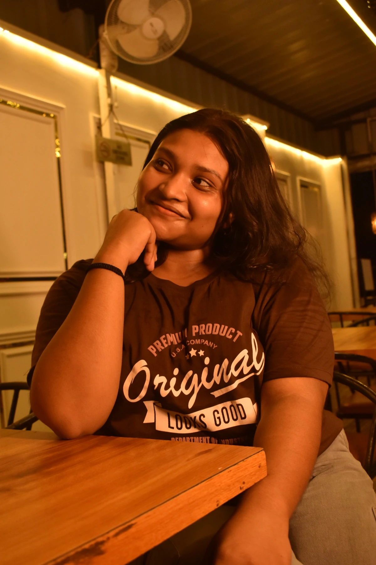 Woman sitting in cafe portrait